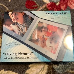 Sharper Image Talking Pictures Album holds 24 photos .